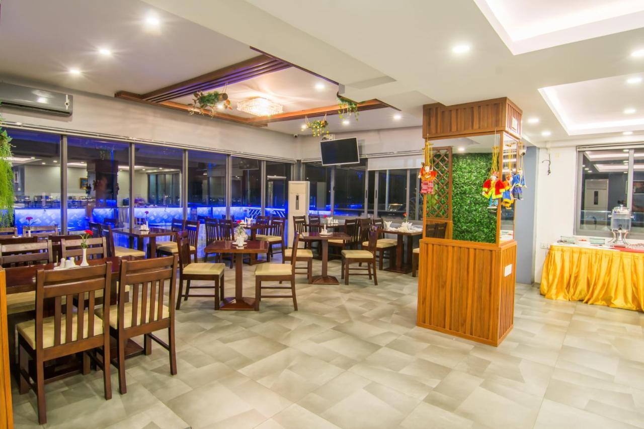 โรงแรมโบตาตอง ย่างกุ้ง ภายนอก รูปภาพ
